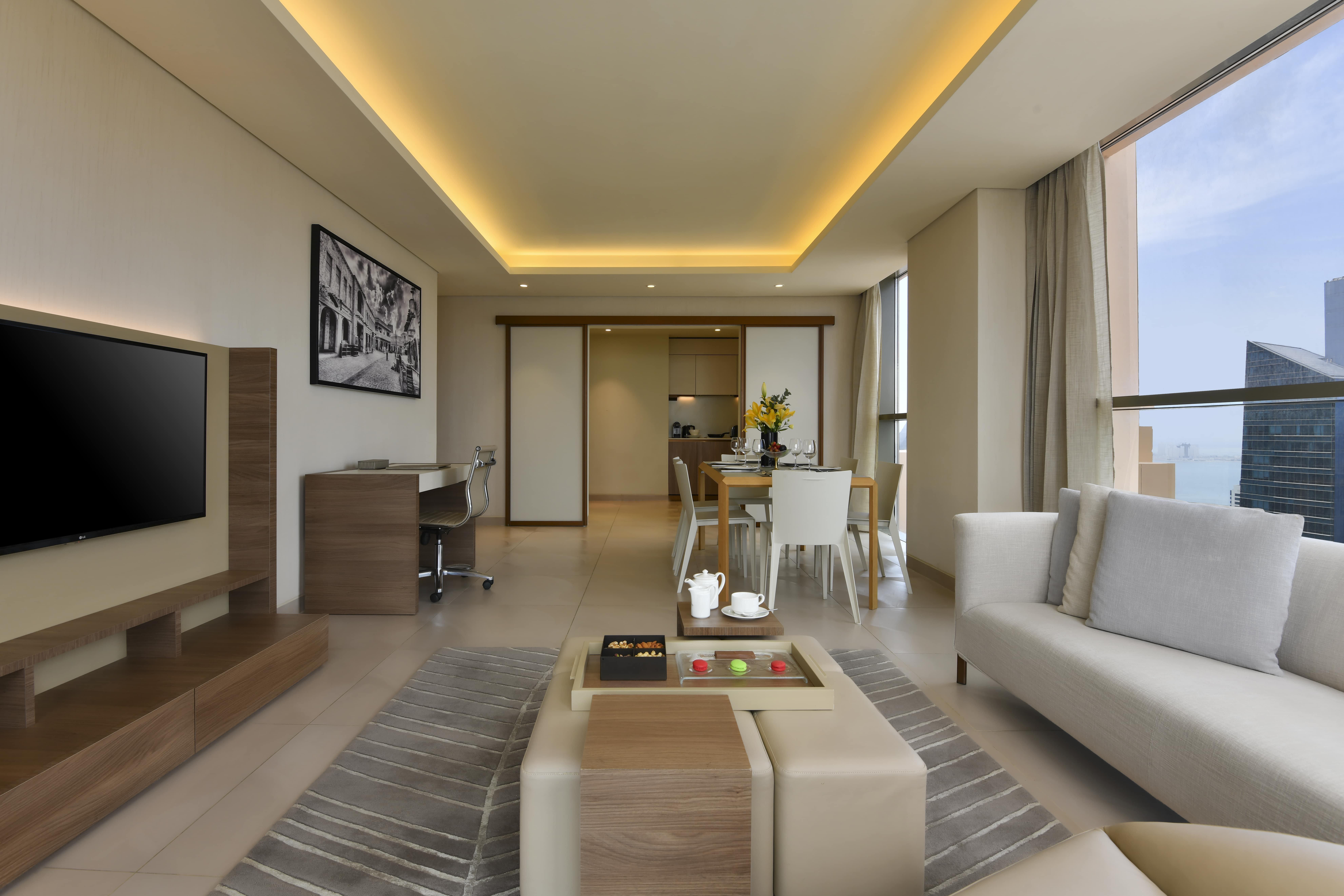 Voco Doha West Bay Suites By Ihg Exterior foto A typical apartment interior