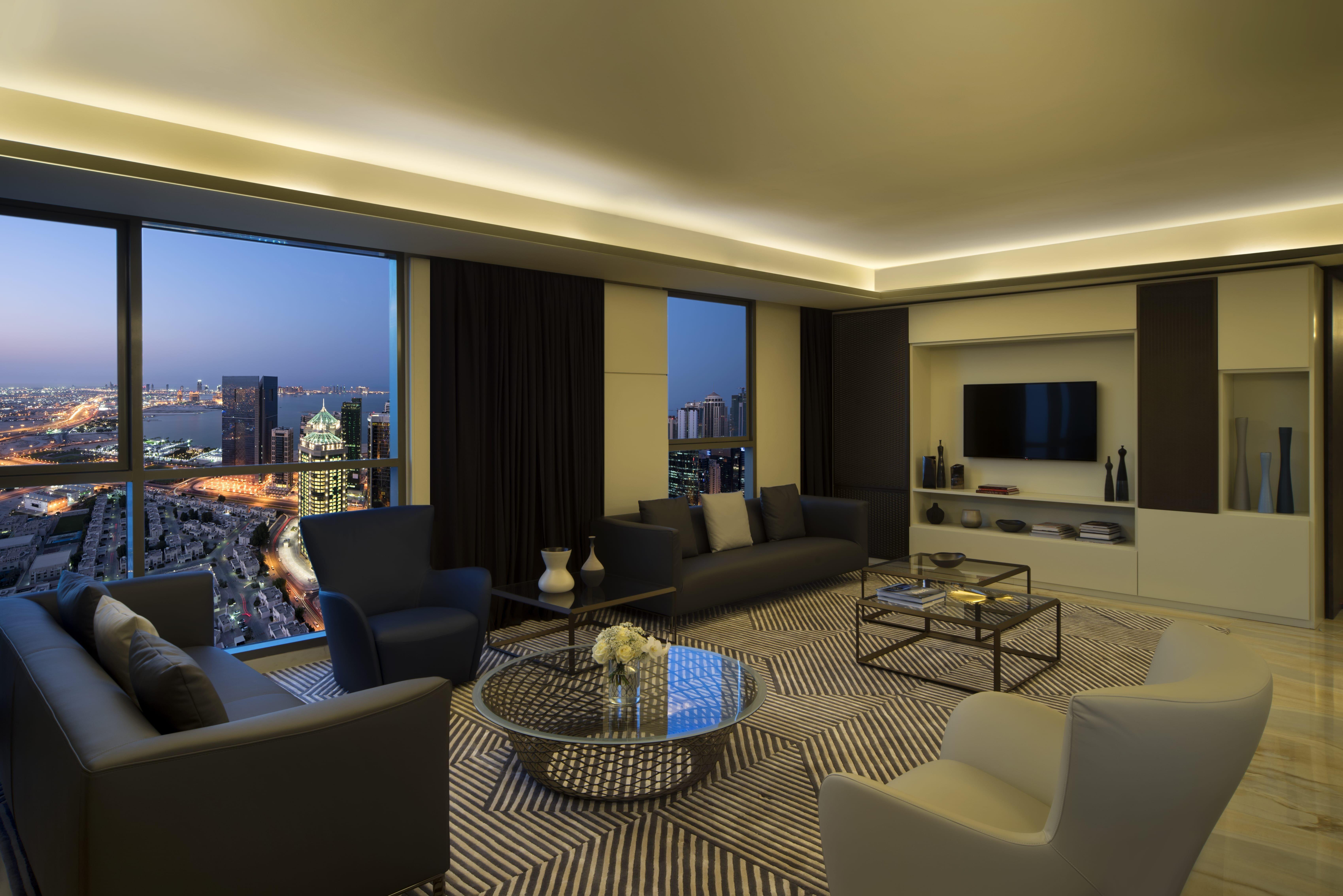 Voco Doha West Bay Suites By Ihg Exterior foto A living room in a typical apartment
