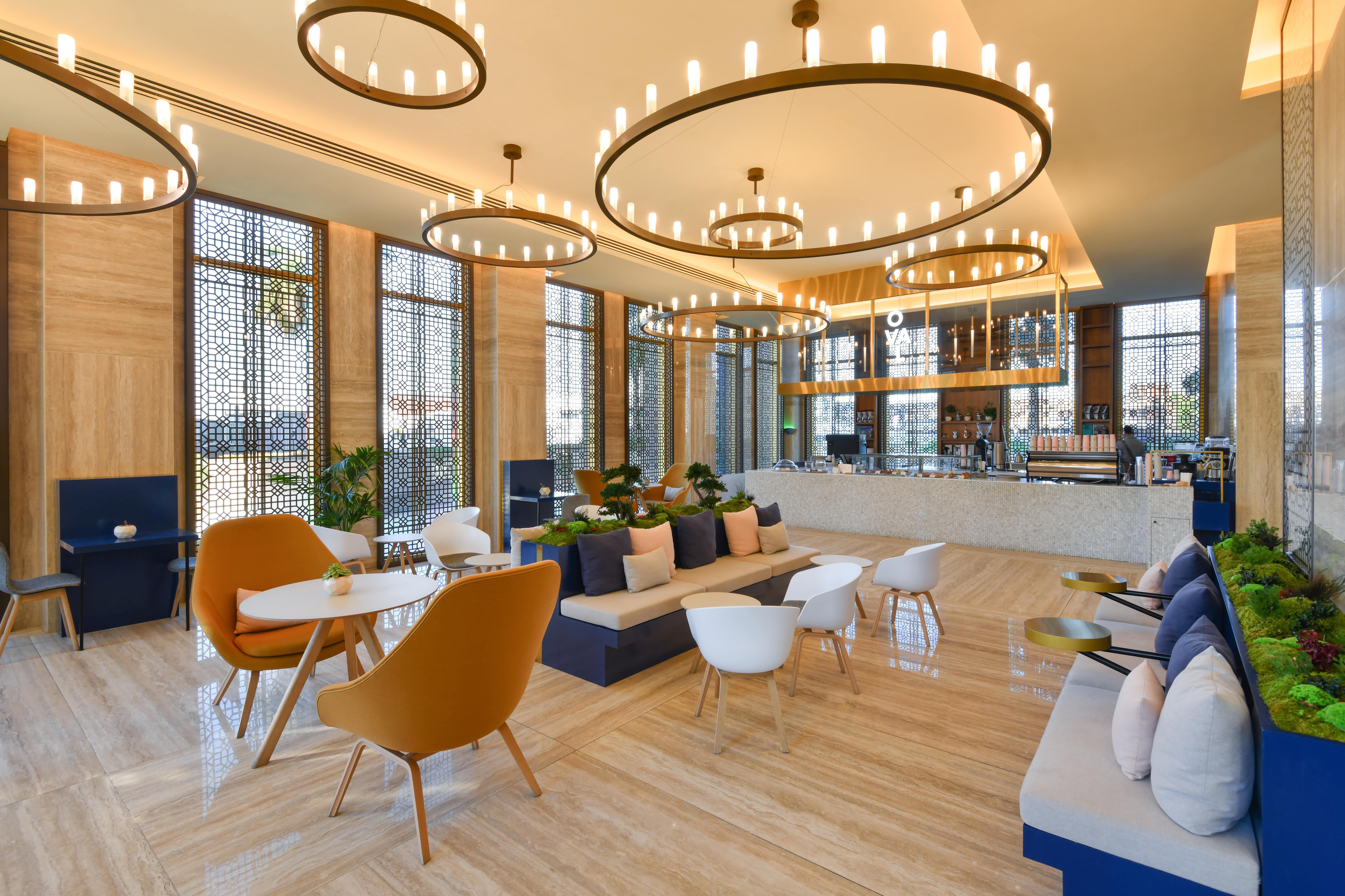 Voco Doha West Bay Suites By Ihg Exterior foto The lounge at the airport
