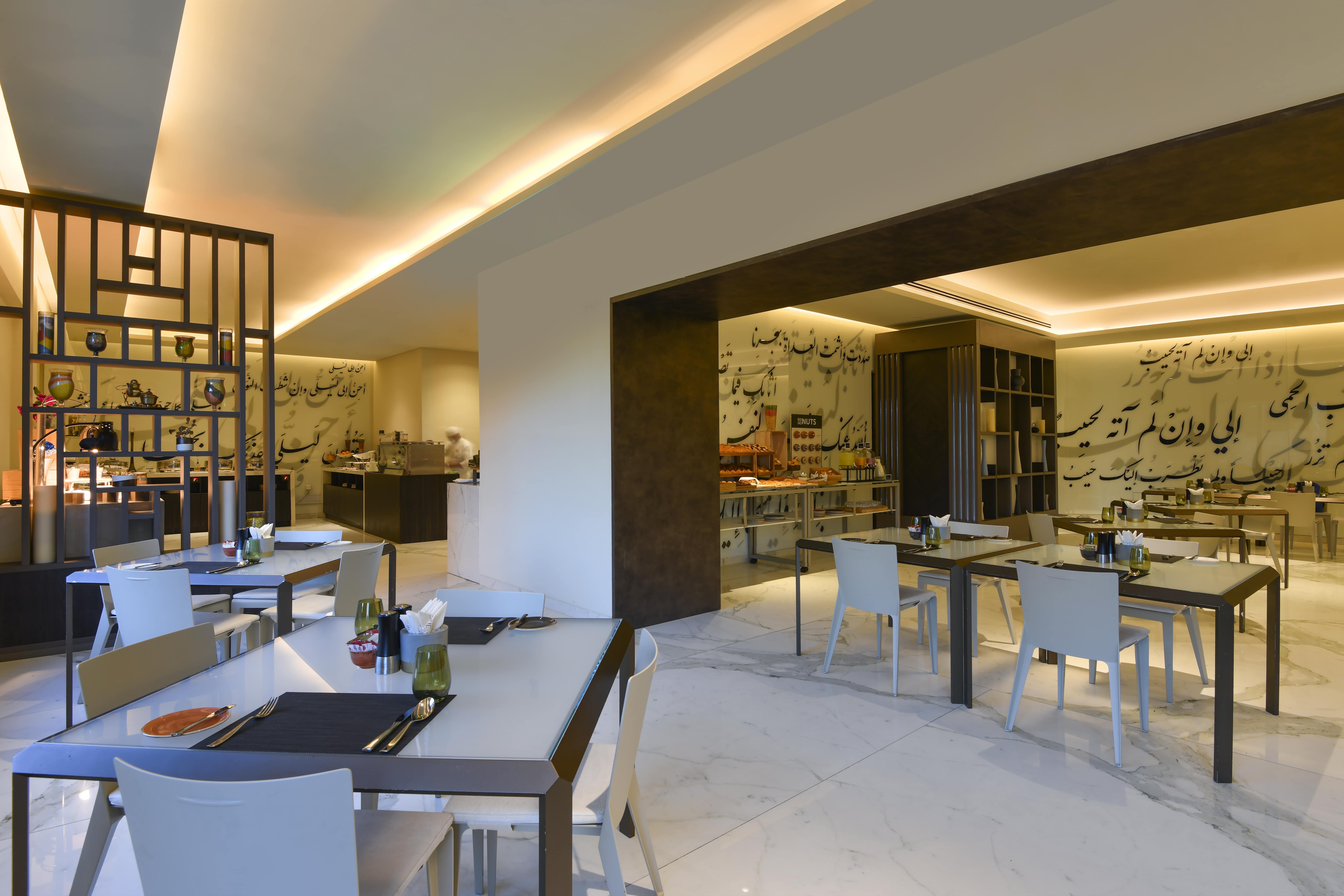 Voco Doha West Bay Suites By Ihg Exterior foto The restaurant